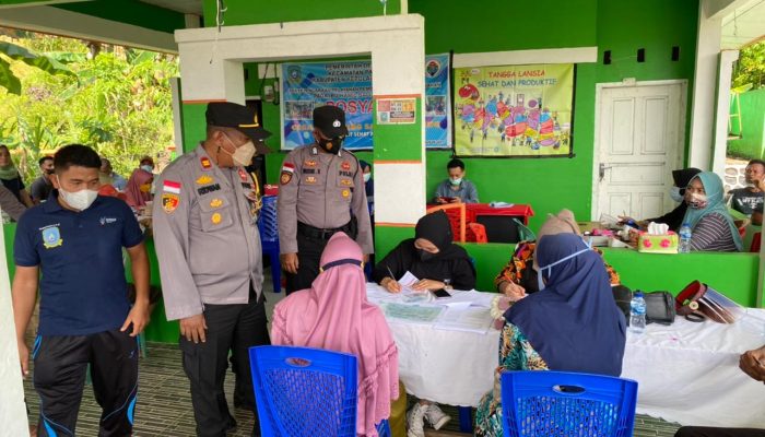 Gerai Vaksinasi COVID-19, Polsek Palmatak Berikan Doorprize pada Warga Desa Candi