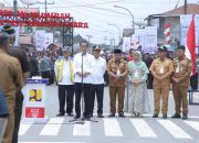 Sekda Asahan Dampingi Presiden Jokowi Resmikan Jalan Inpres