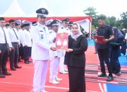 Bupati Kasmarni Kukuhkan Perpanjangan Kades dan BPD Kecamatan Pinggir dan Talang Muandau Secara Serentak